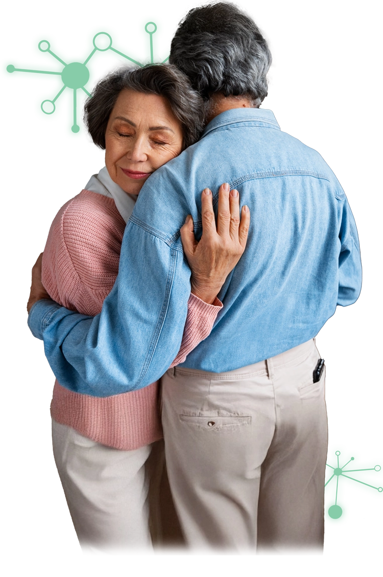 Pareja adulta abrazándose en reconciliación, representando la sanación del vínculo amoroso en Constelaciones Familiares.